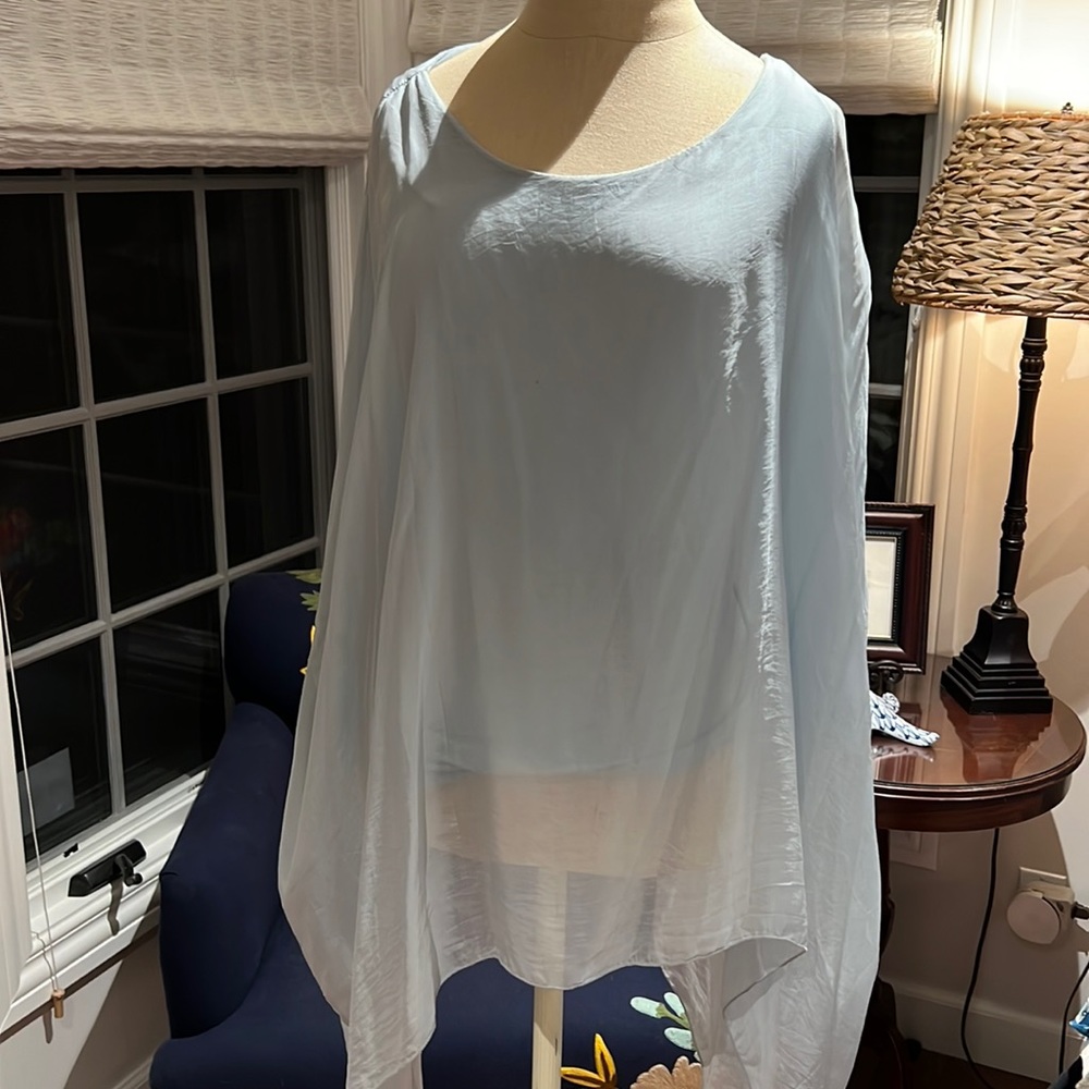Light gauze blue overlay top size medium to large. Bought in Greece.